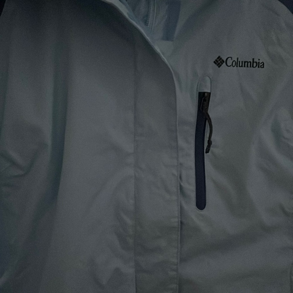 The color is baby blue with a dark blue hoodie